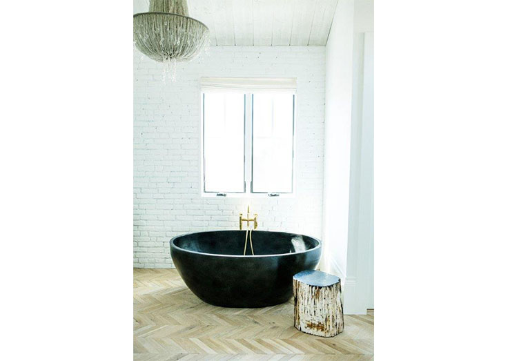 Modern bathtub in minimalist dark